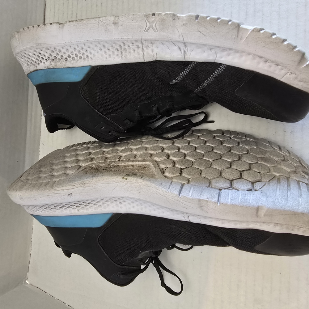 Black and‎ White Athletic Sneakers with Blue Accent